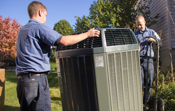 Technicians Installing an Air Conditioner