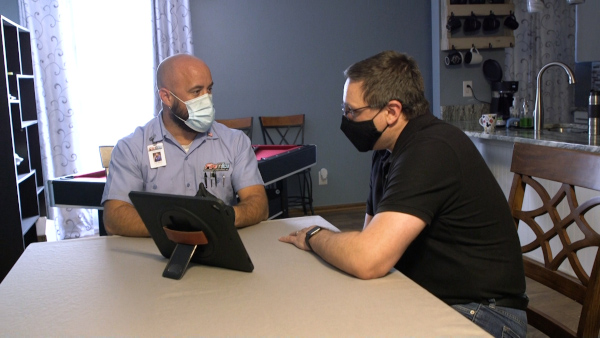 HVAC sales associate with a customer