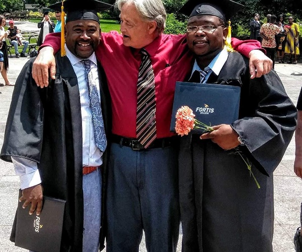 Dean Platt at Fortis College with graduates